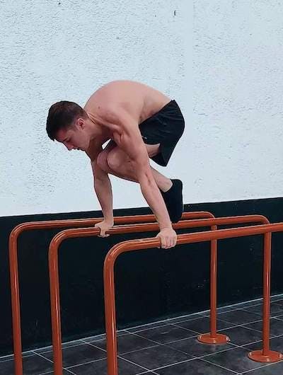 Tucked planche dips