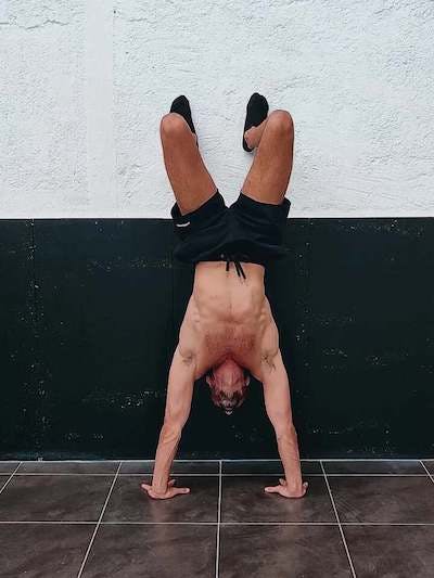 Assisted handstand push-up