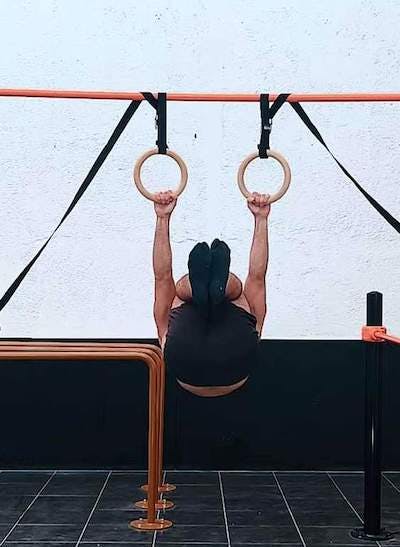 Tucked front lever to inverted hang on rings