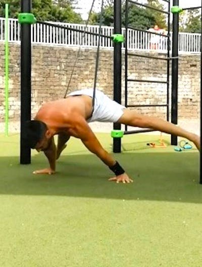 Straddle planche with elastic band