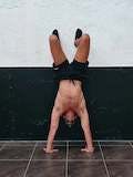 Assisted handstand push-up